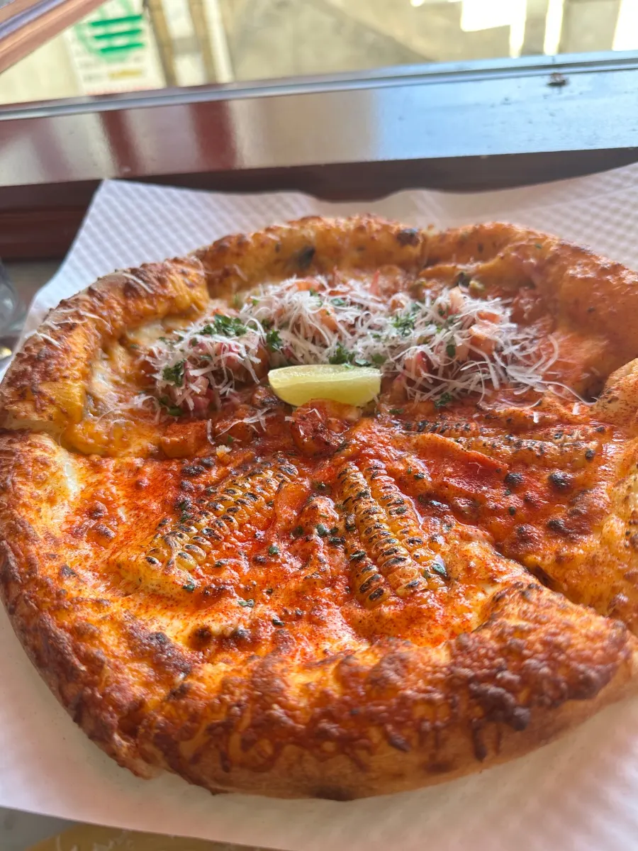 Taco pizza with added cilantro