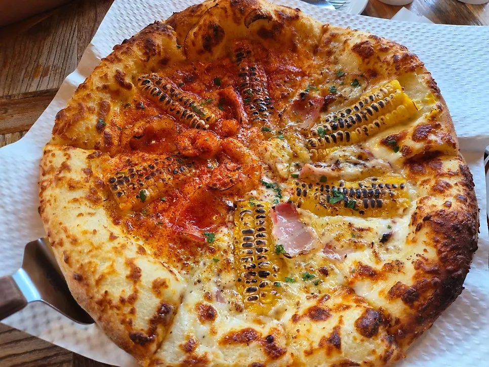 Ordered corn pizza and pasta dishes