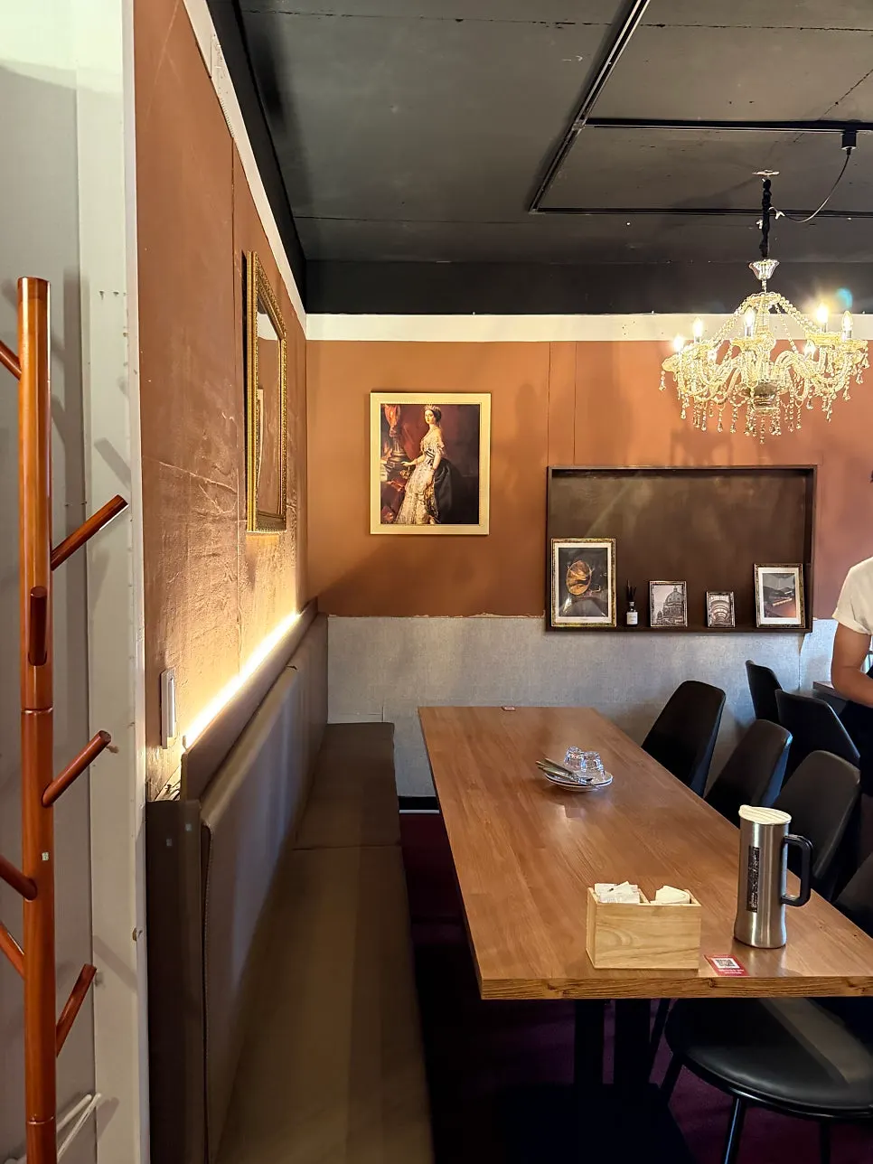 Interior with wood furniture and chandeliers