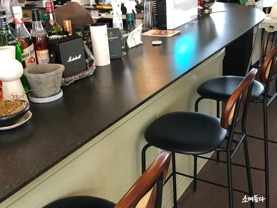 Group and bar tables at Nonchalant Lounge