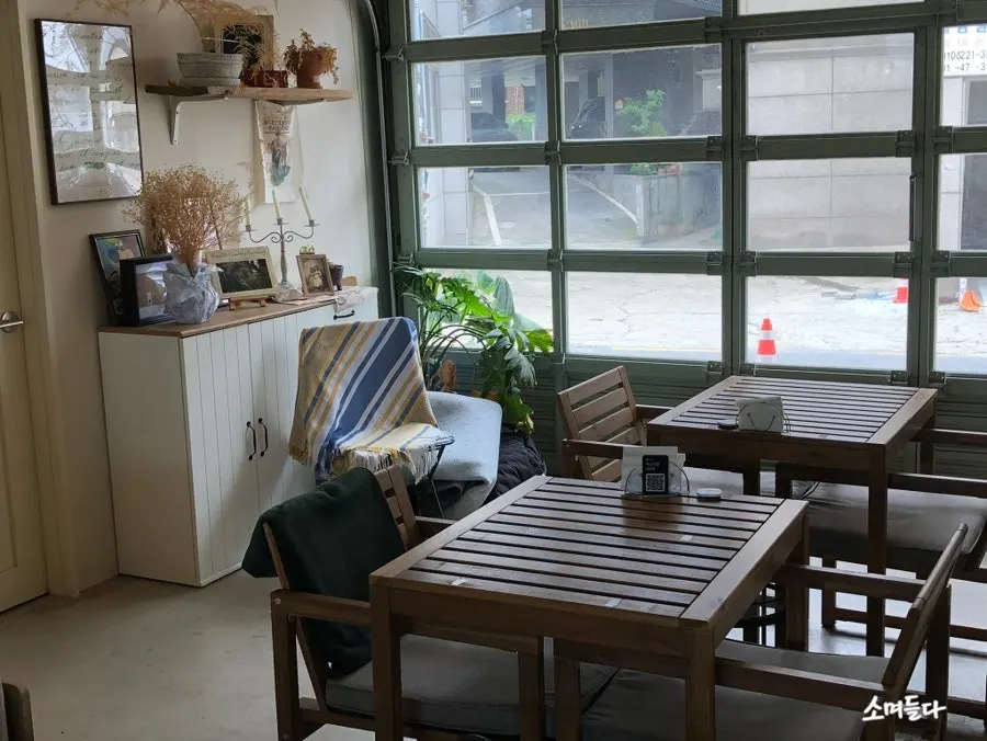 Window-side seating at Nonchalant Lounge