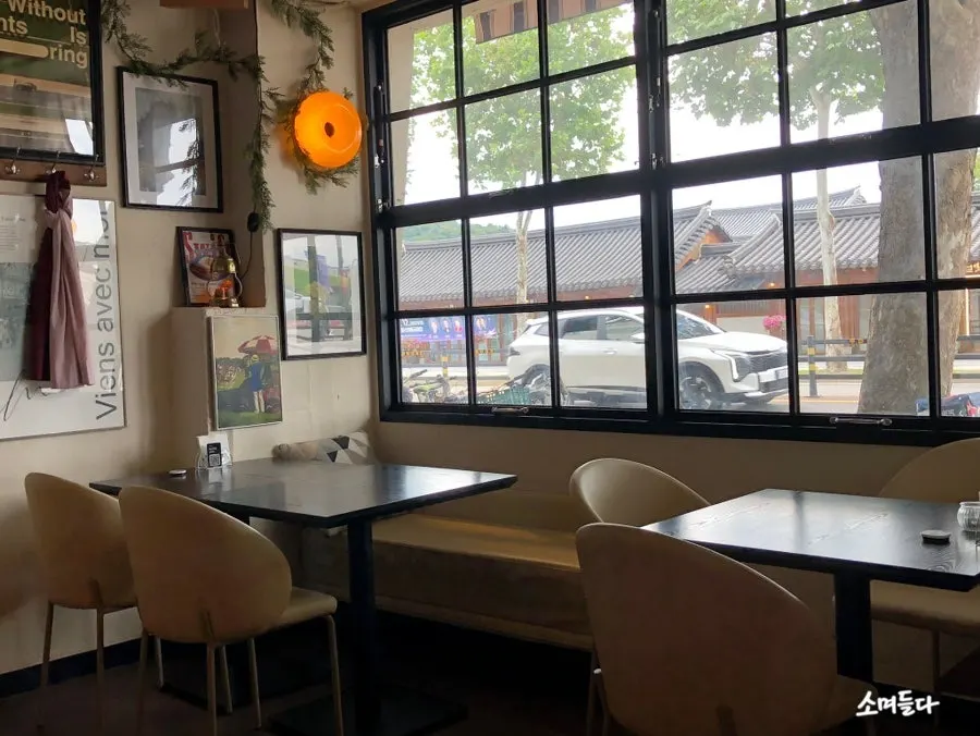 Nonchalant Lounge interior with floor-to-ceiling windows