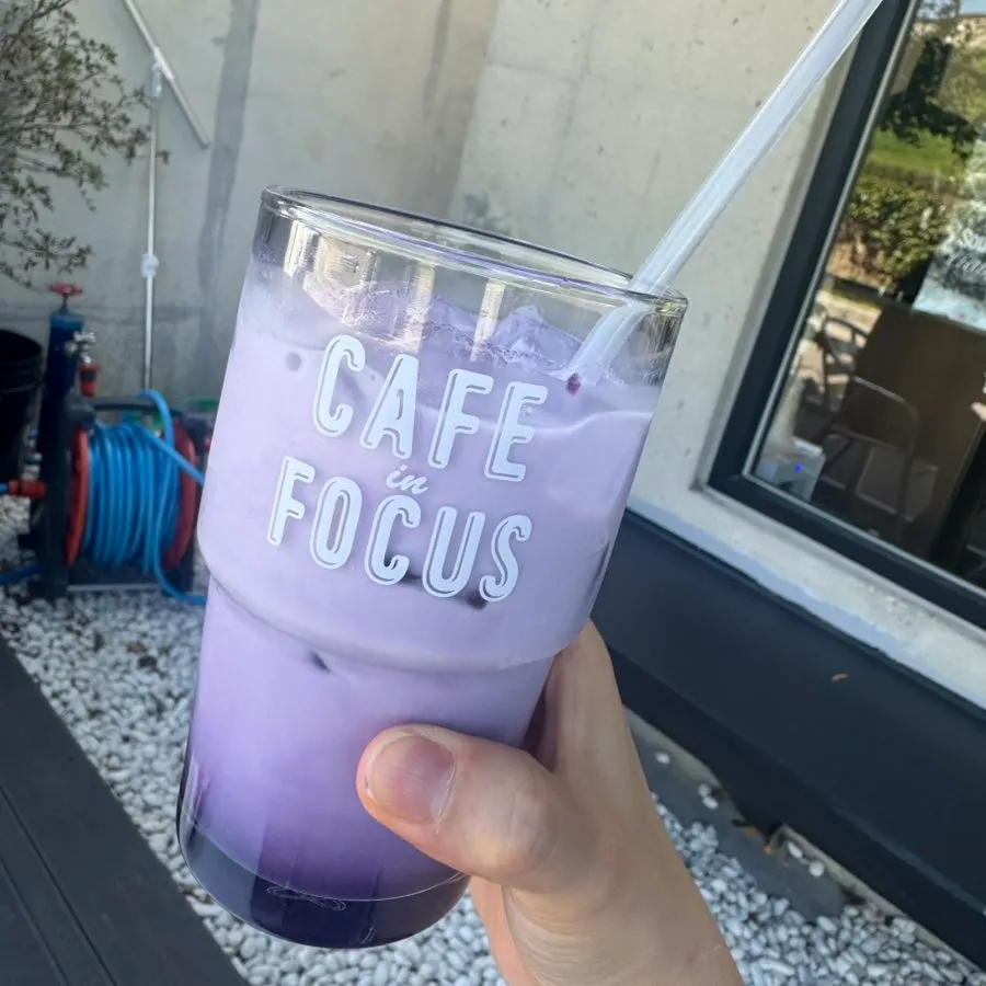 A cup of purple ube latte