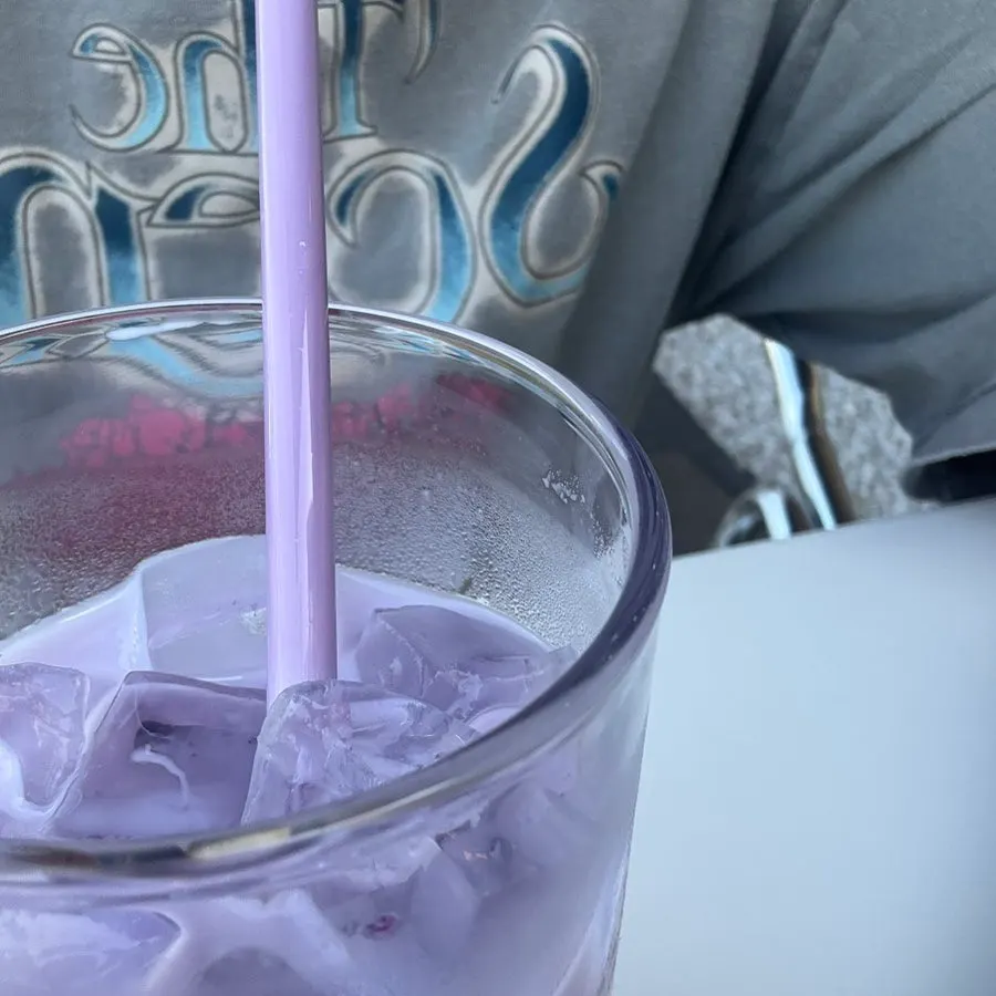 Close-up of the ube latte showing its milk layer