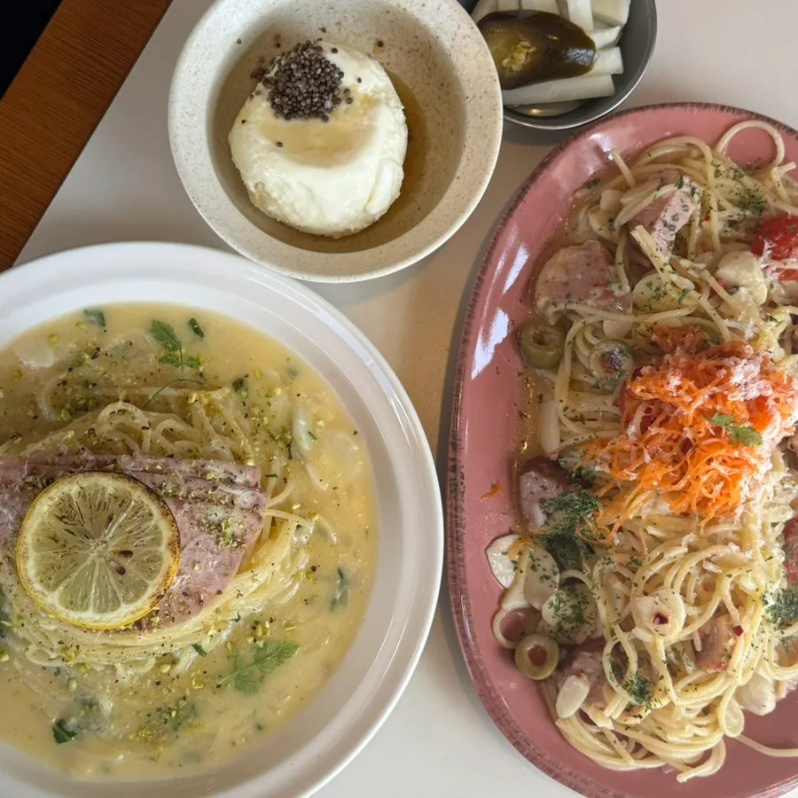 Table set with two pasta dishes