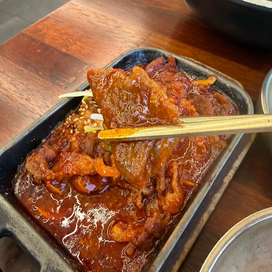 Small tasting side of spicy stir-fried pork