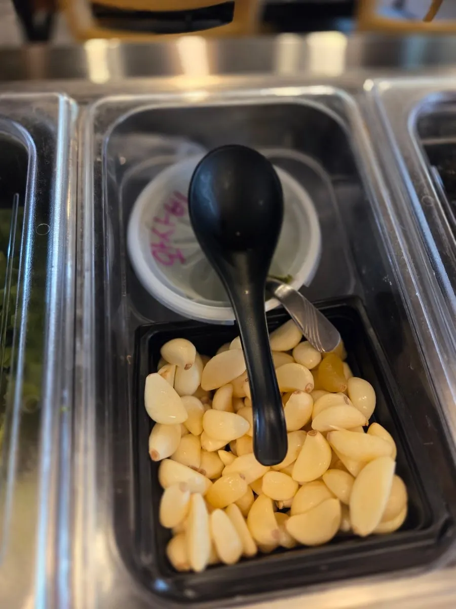 Baek-kimchi and kimchi at the self-serve bar