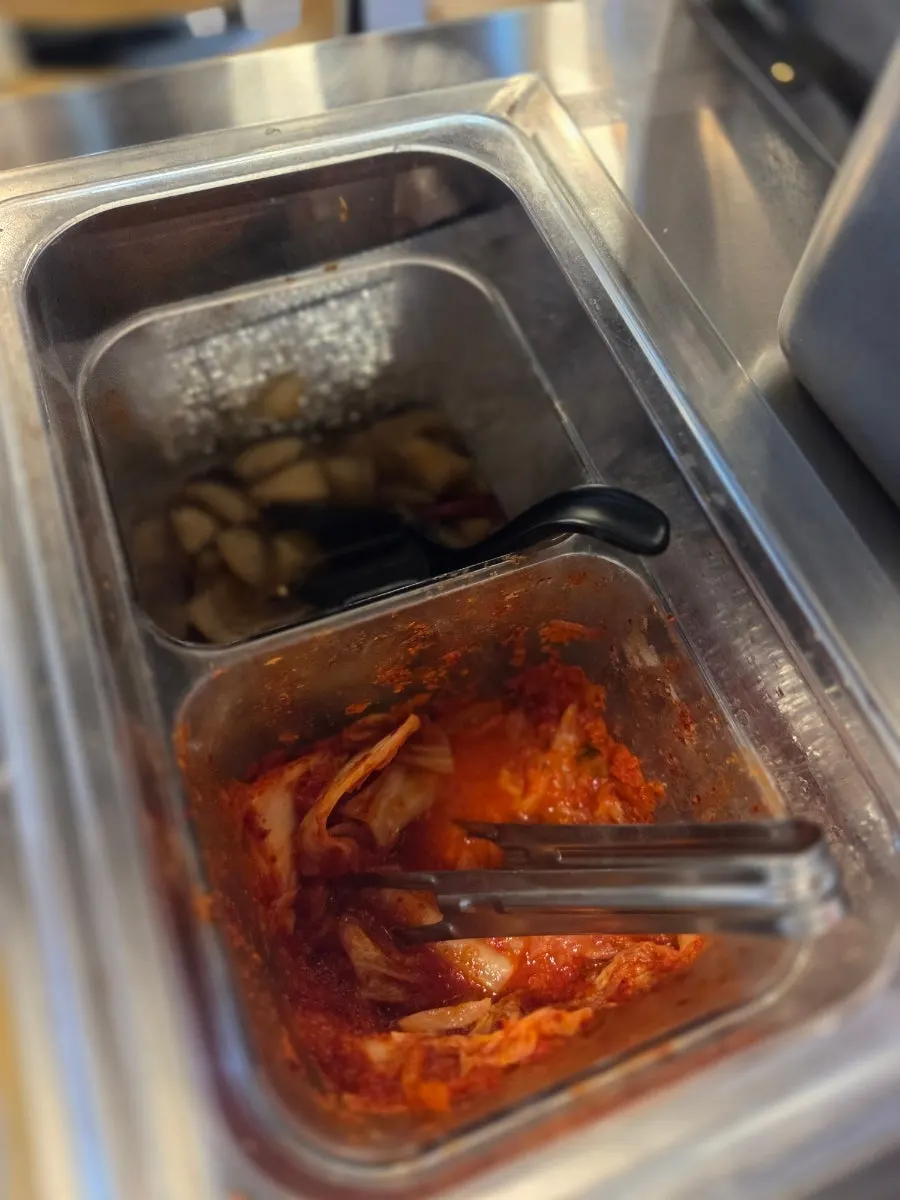 A plate of self-serve side dishes