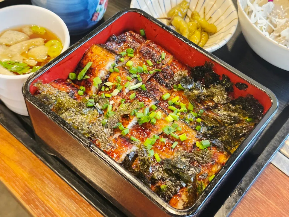 Close-up of bite-sized seasoned eel