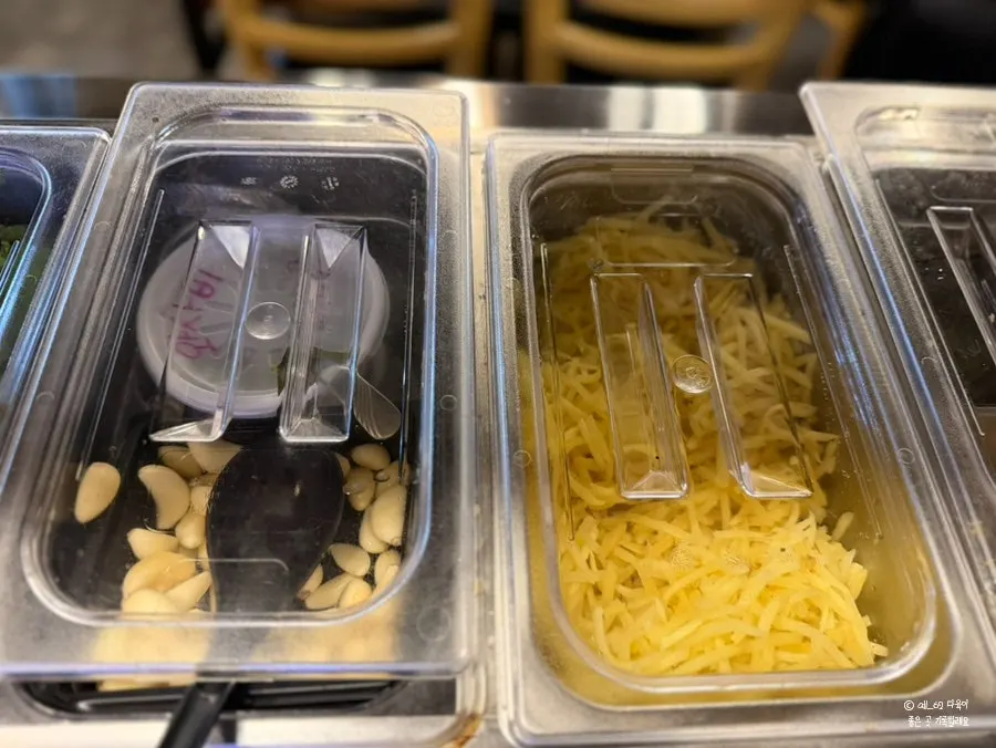 Side dishes and lettuce wraps at the self-serve bar