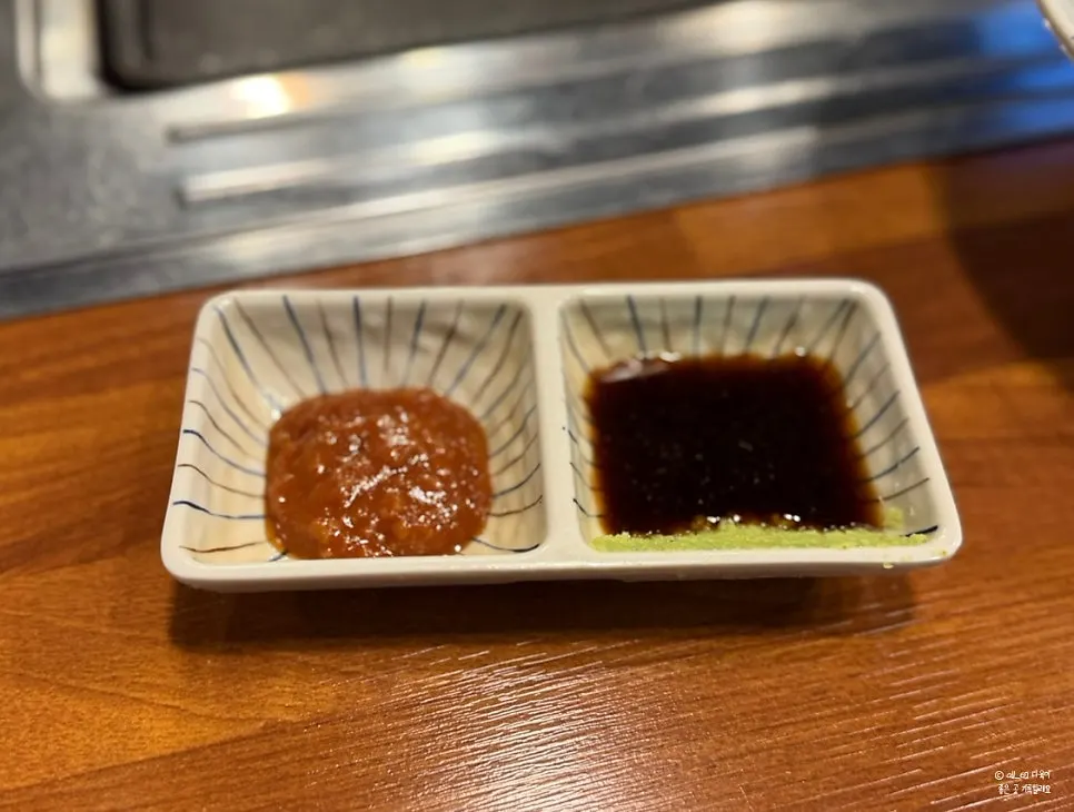 Julienned ginger and basic side dishes to pair with the eel