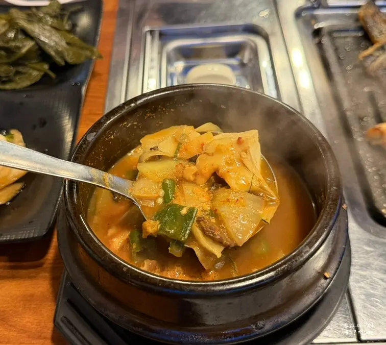 The complimentary miso soup served with the meal