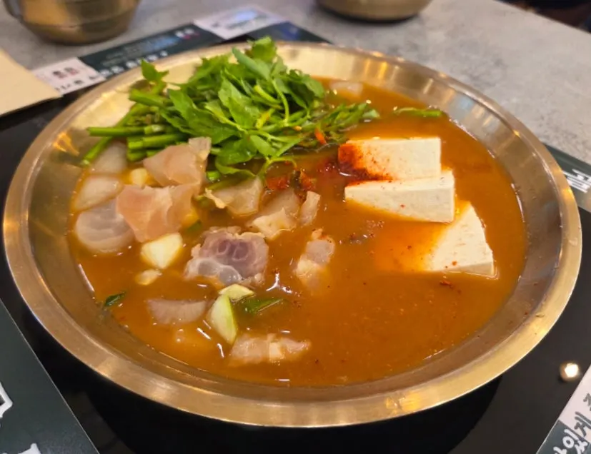 Beef tendon doenjang hot pot and squid soft tofu hot pot