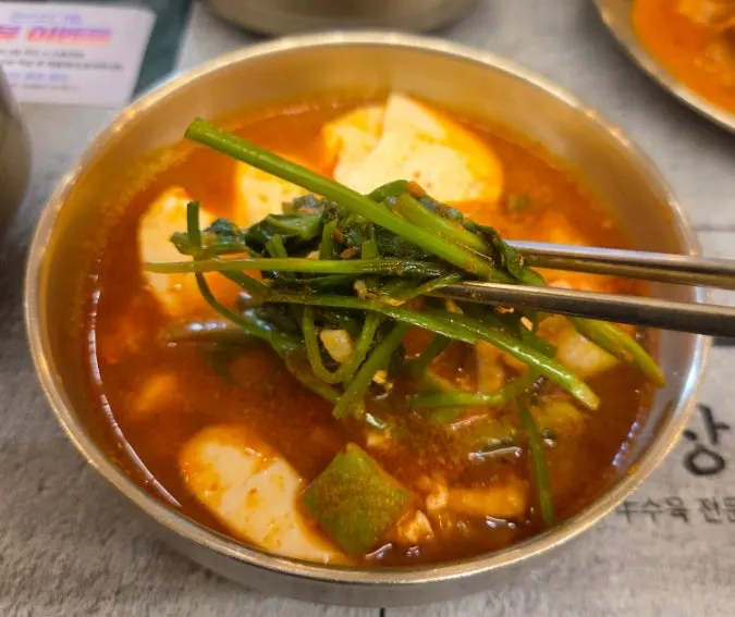 Squid and minari soft tofu hot pot