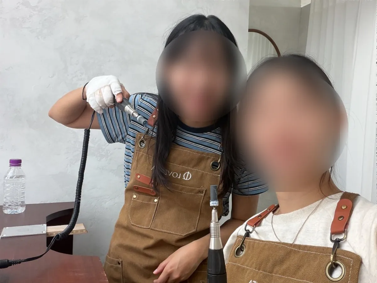 Starting the ring-making workshop wearing an apron