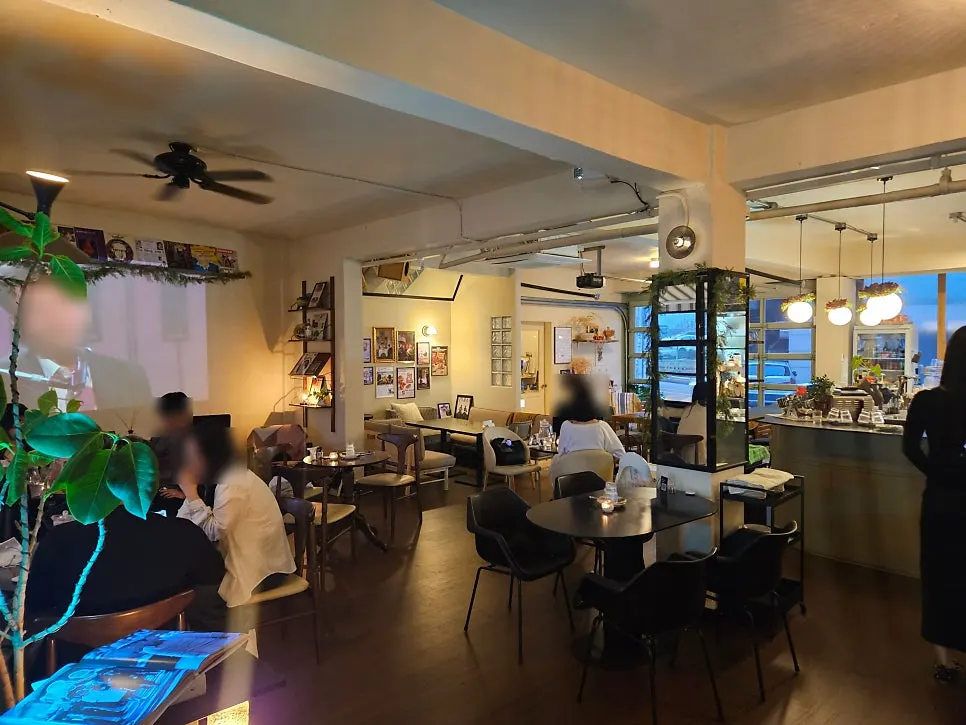 Full evening interior view of Nonchalant Lounge