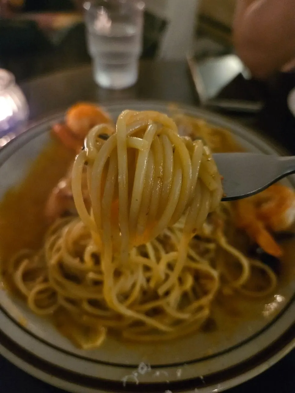 Plump shrimp on top of the rosé pasta