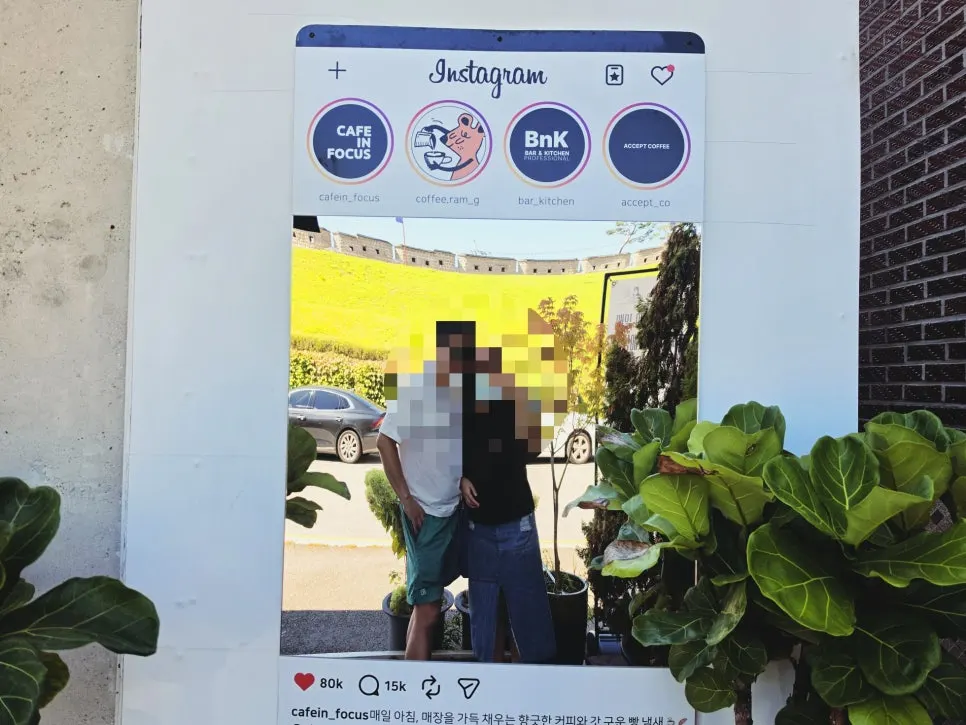 Instagram-frame-shaped photo zone outside the café