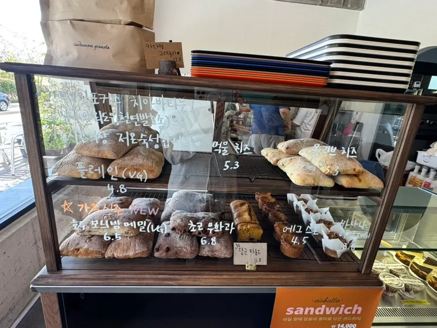 Dessert case with Basque cheesecake and scones