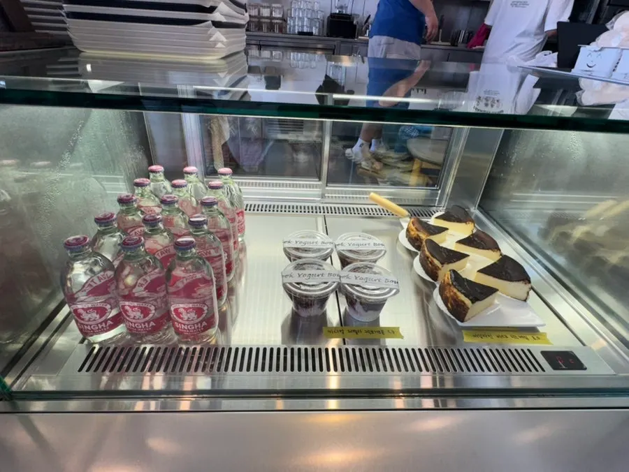 Bakery display of ciabatta and muffins