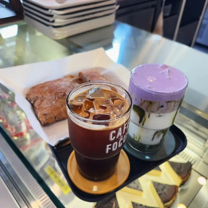 Order of ube cream matcha latte, iced americano, and ciabatta