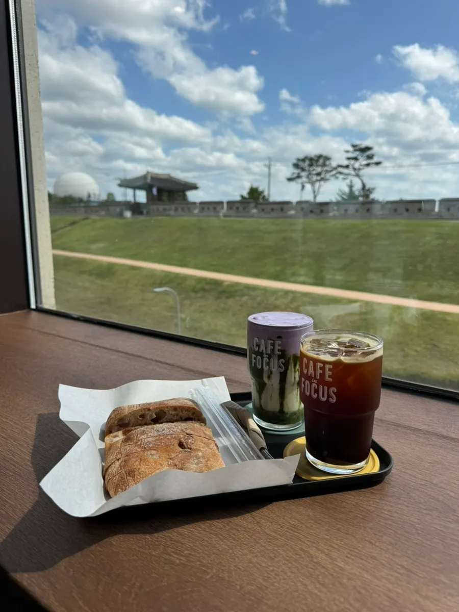 Drinks and ciabatta set on a 3rd-floor window table