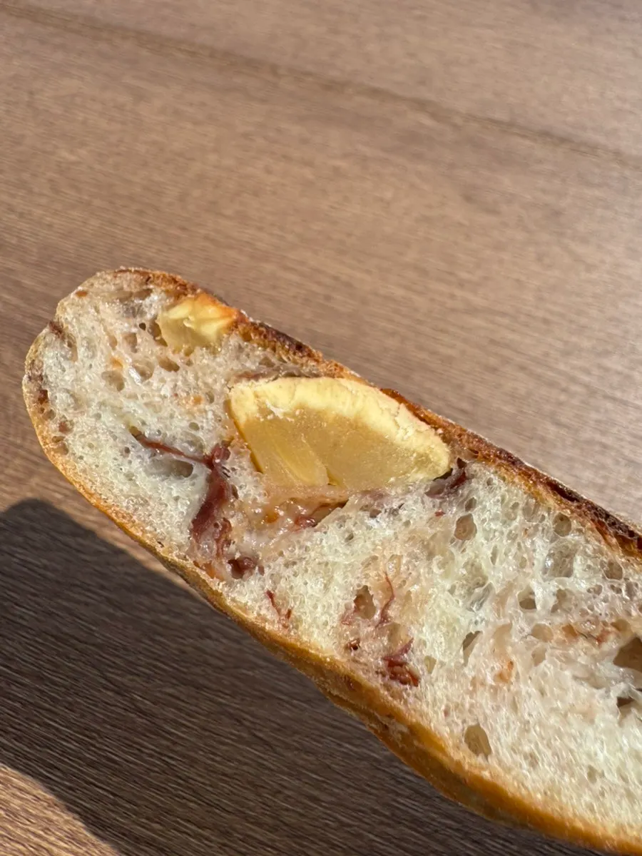 Cross-section of the ciabatta showing walnuts and candied chestnut