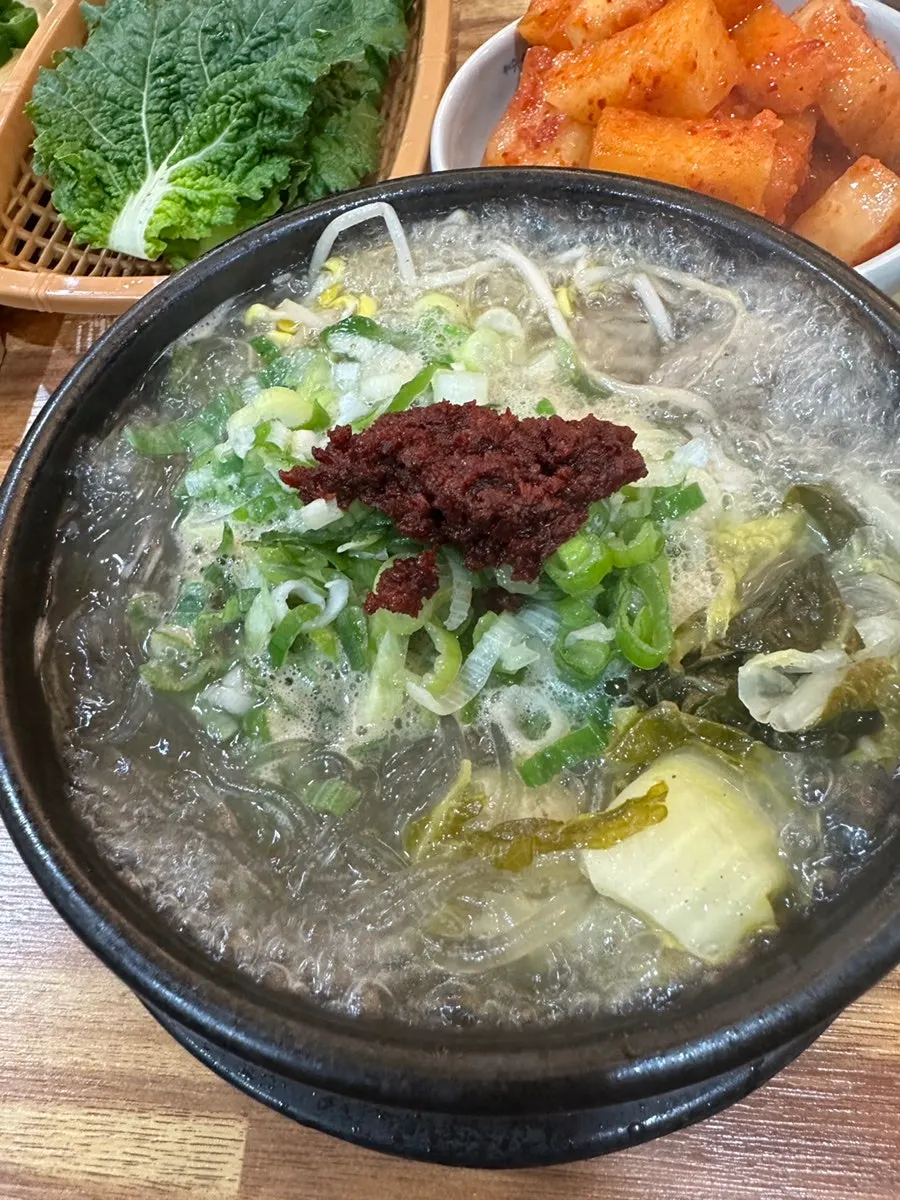 Boneless hangover soup arriving still boiling in a stone pot