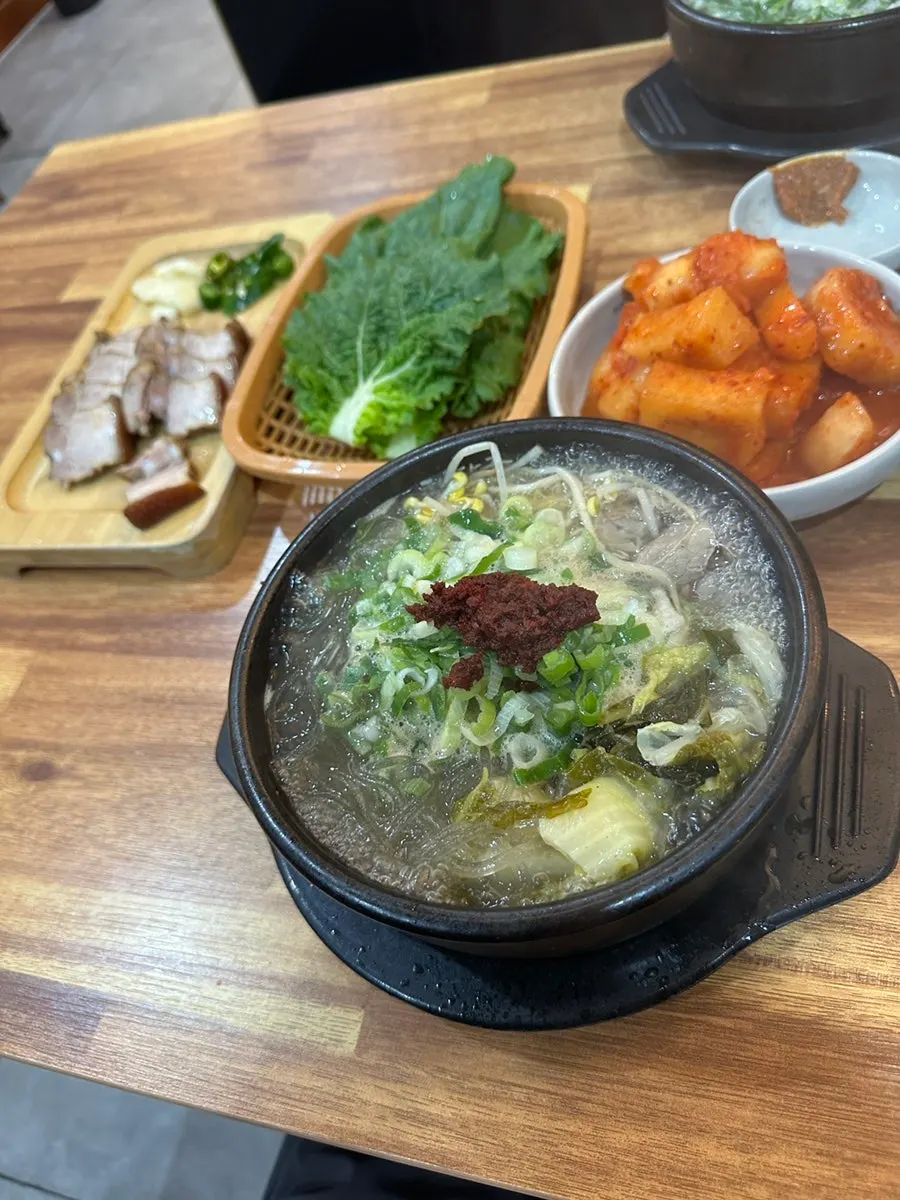 Hangover soup served with a bowl of rice