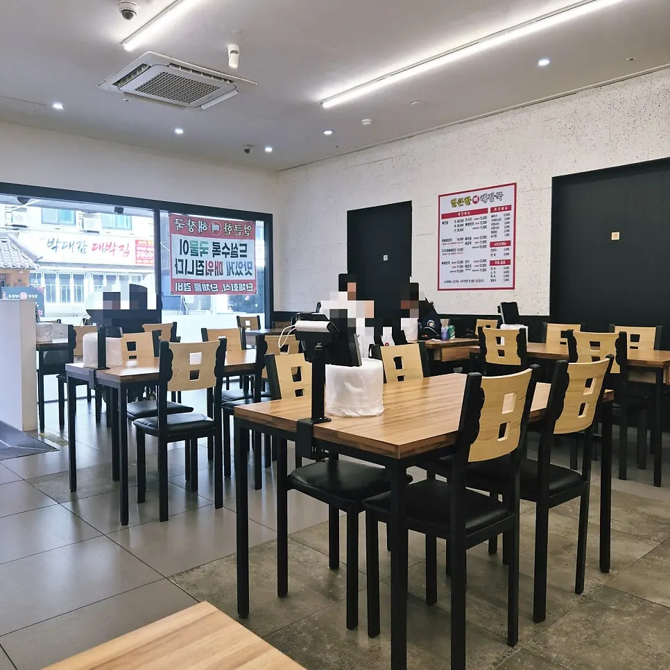Spacious, clean dining hall seating at the haejangguk restaurant