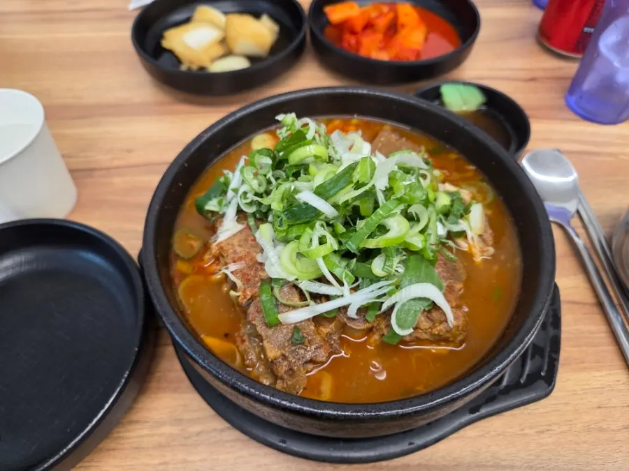 Spicy pork bone soup served in a stone pot