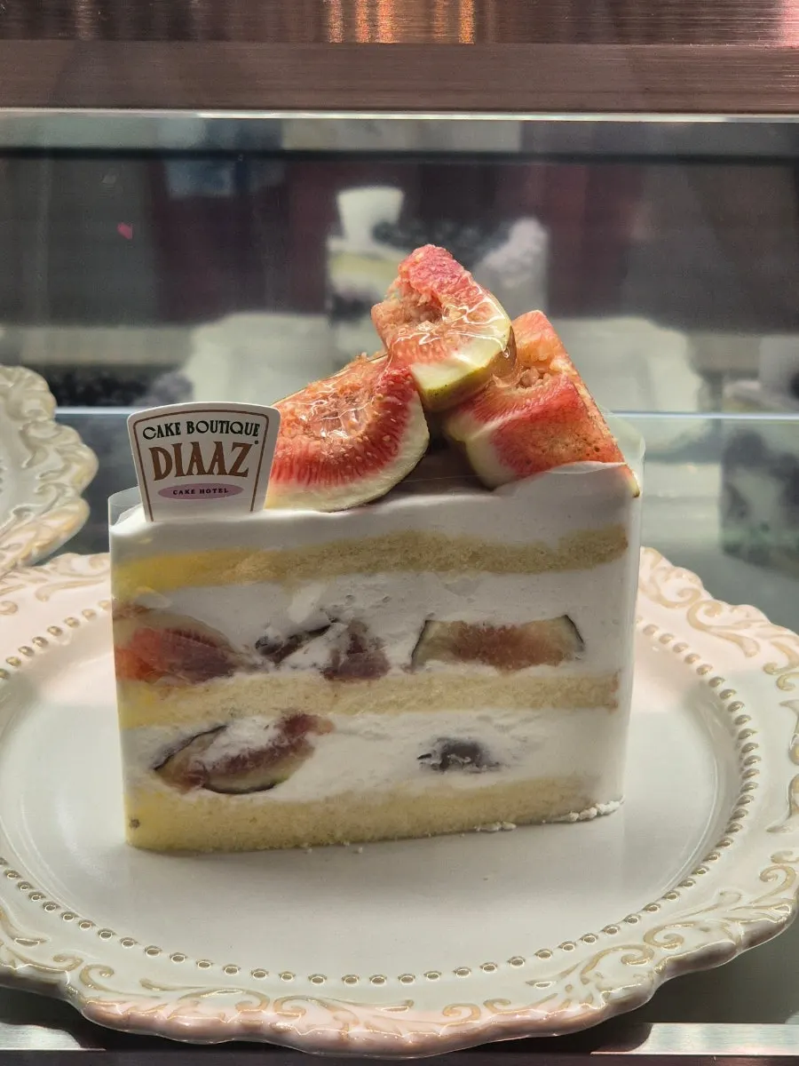 Packed blueberry, fig, and peach cake slices