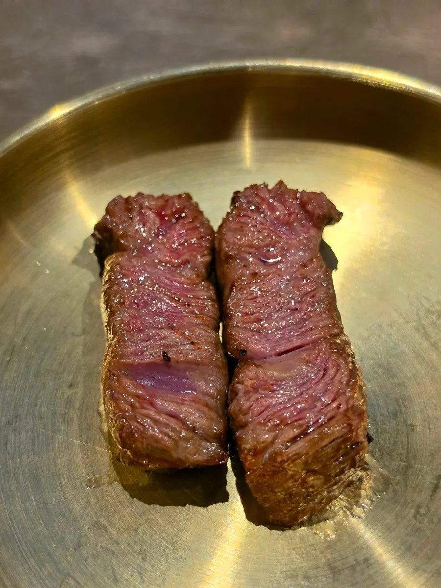Hanwoo sirloin placed on the grill