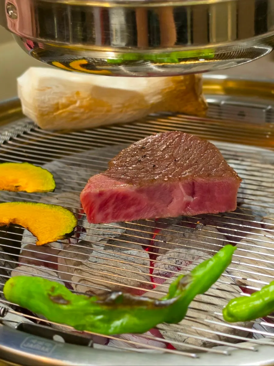 Hanwoo chuck flap cooking on the grill