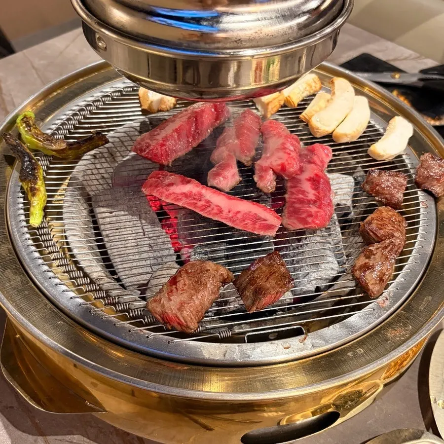 Mushrooms and vegetables grilled alongside the meat