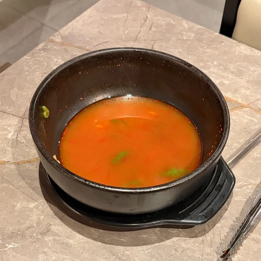 Empty bowl after finishing the seafood ramyeon broth