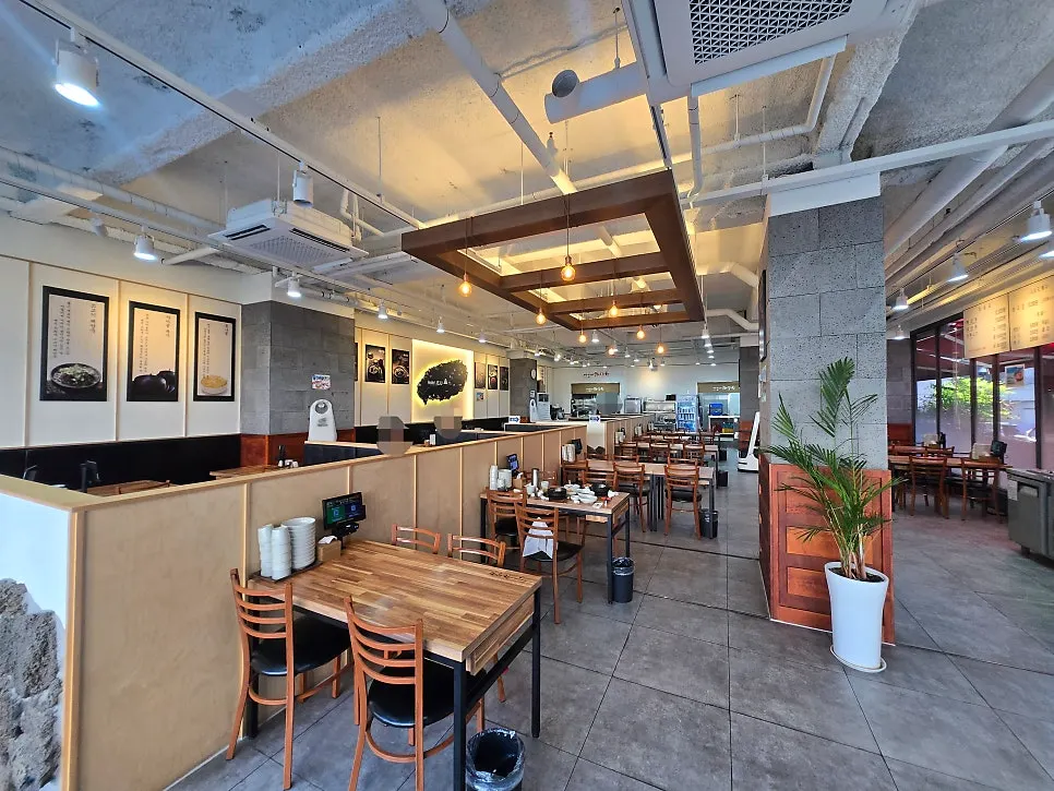 Spacious dining hall with generous table spacing