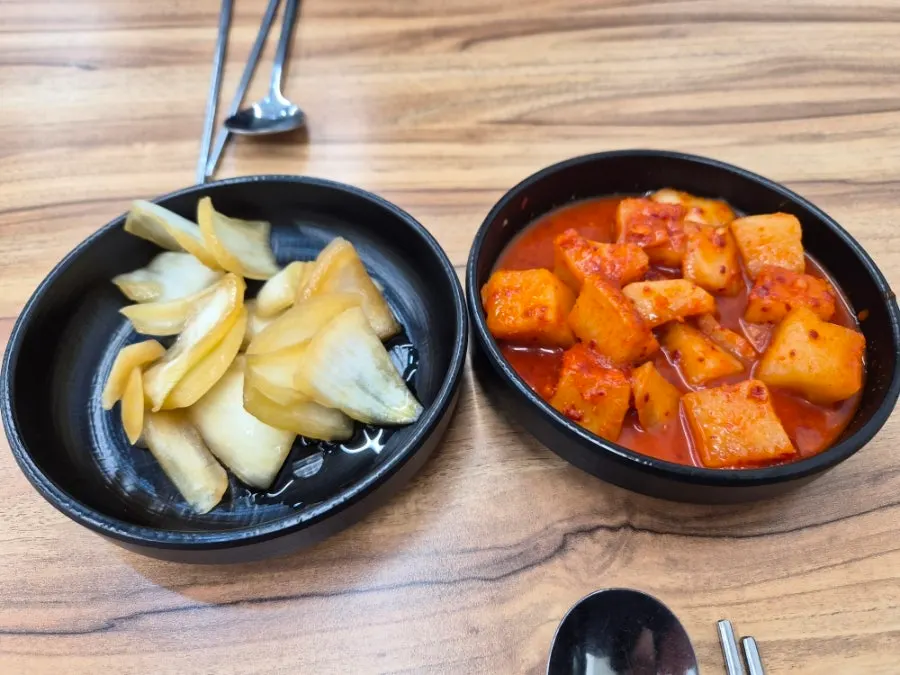 Self-serve bar with kkakdugi and pickled onions