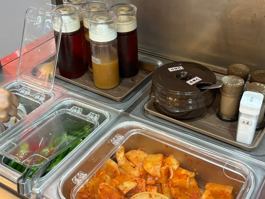 Rice in the warmer and self-service utensils