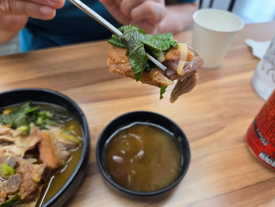 Gamjatang broth bubbling away in the hot pot