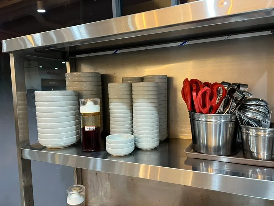 Chili oil and pepper condiments on the table