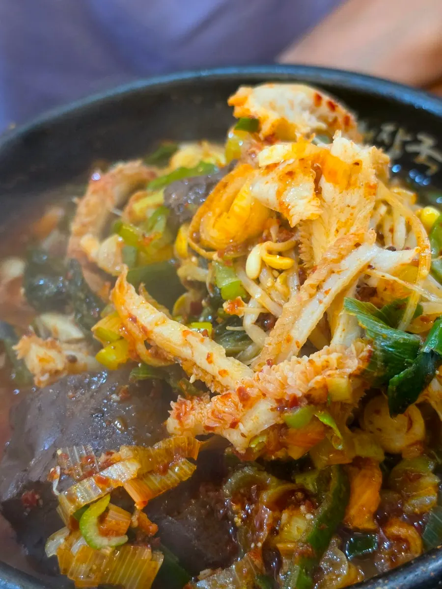 Tripe soup bowl with the solid ingredients scooped out