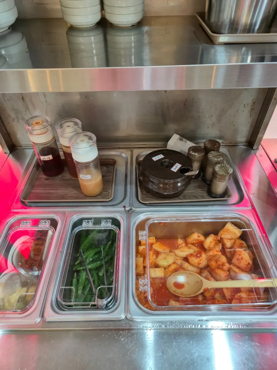 Self bar with baby spoon, fork, and scissors