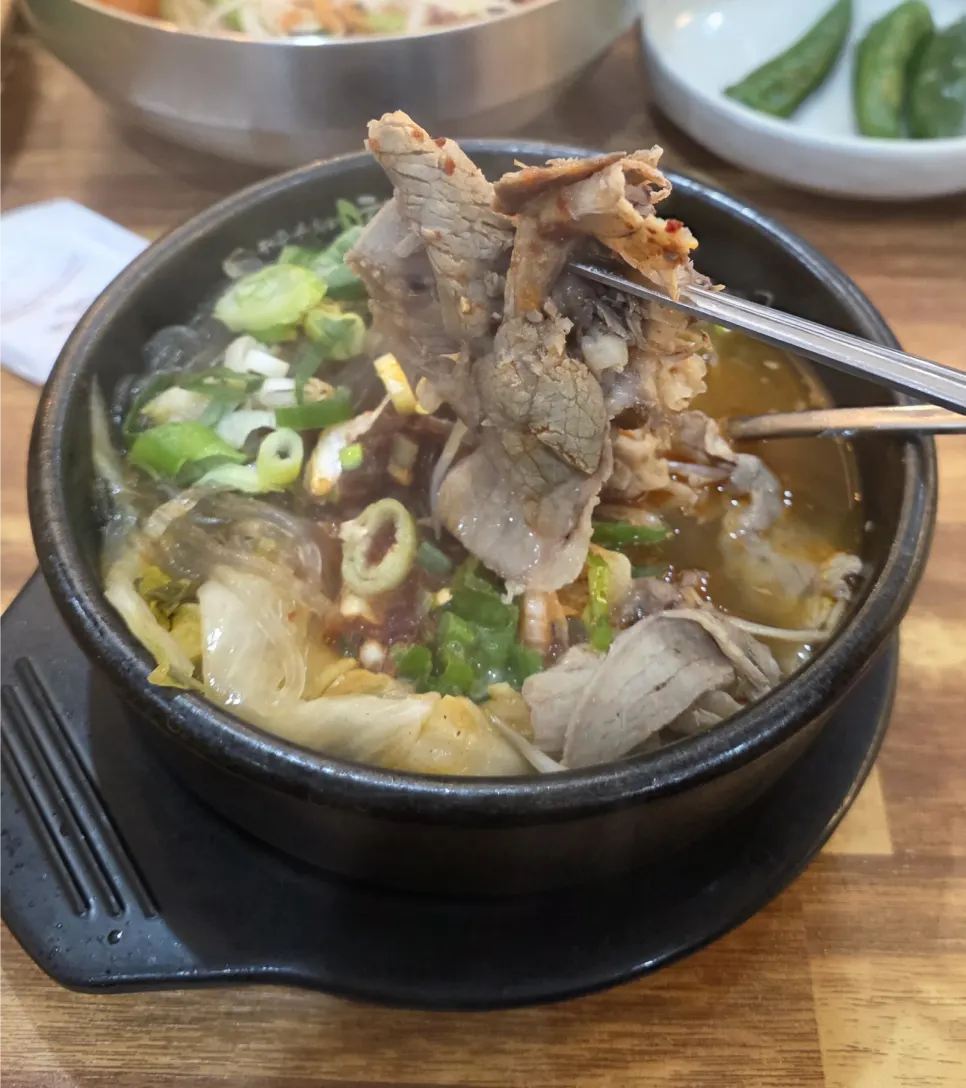 Meat lifted out of the hangover soup broth