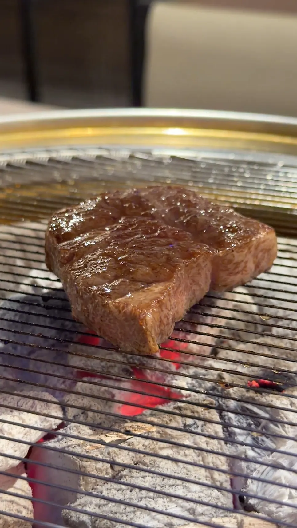 Hanwoo flat iron cooking on the grill
