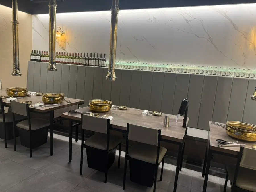 BBQ restaurant table seating with space between seats