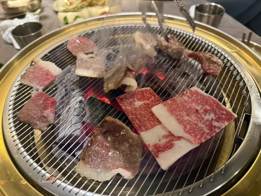 Beef placed beside a small dish of salt