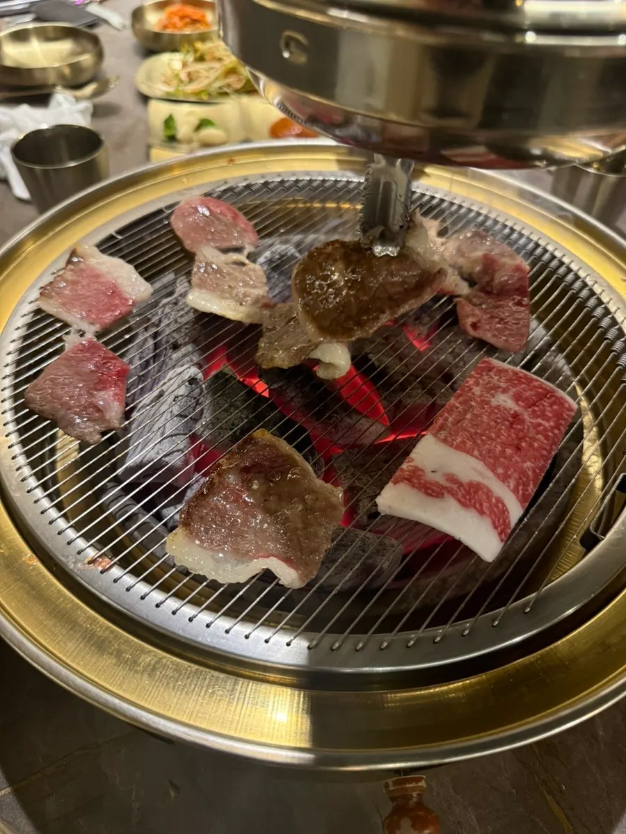 Assorted hanwoo and chadolbaegi set out on the table