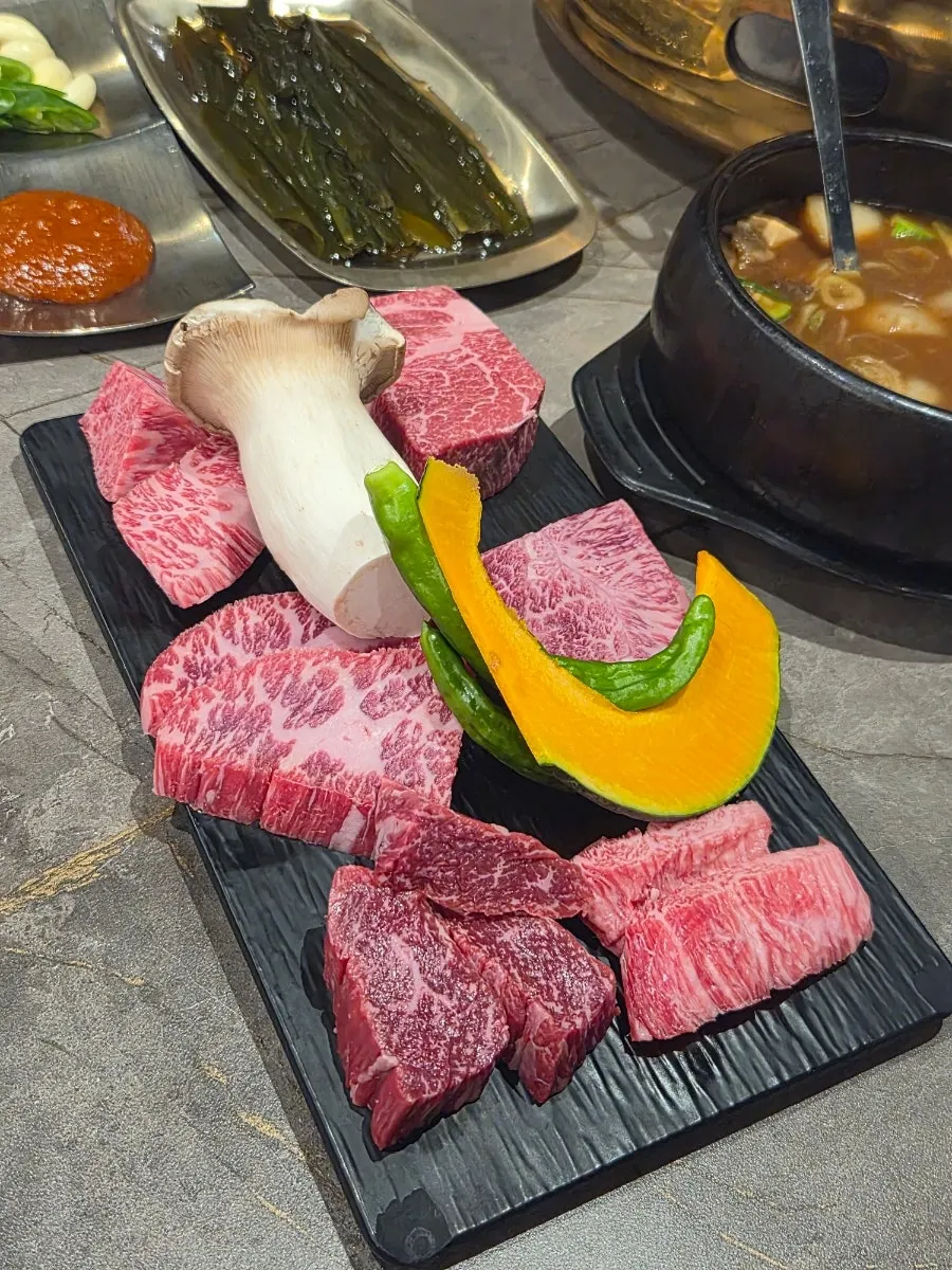 Assorted hanwoo set for two with doenjang sulbap on the table