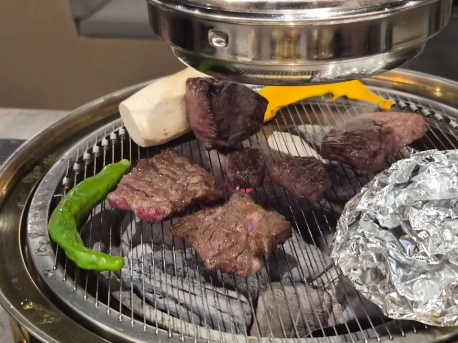 A piece of hanwoo grilled to a different doneness